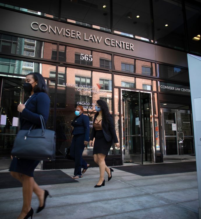 Students walking in front of the Conviser Law Center